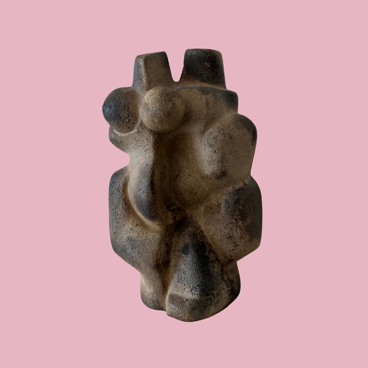 picasso style sculpture on pink background